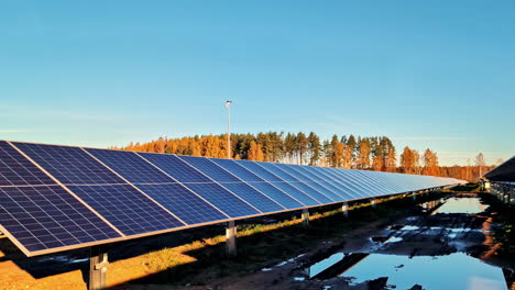 Solar panel farm photovoltaic array view from ground up-close in Riga Latvia