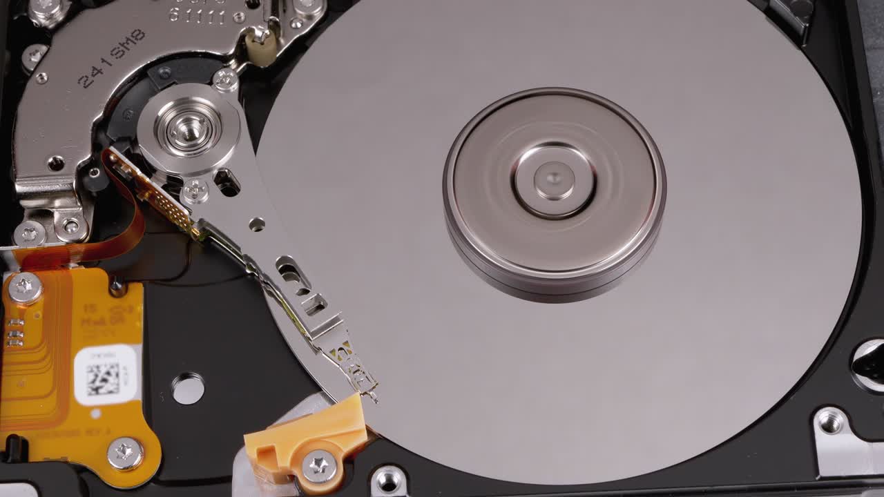 Hard Disk Drive Inside. Structure of HDD, Spinning Platter. Move magnetic head
