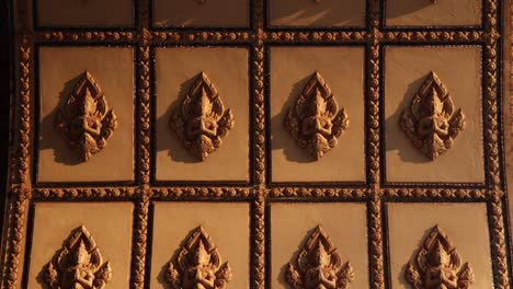 intricate carvings on the archway of the patuxai victory monument in the center of vientiane, laos