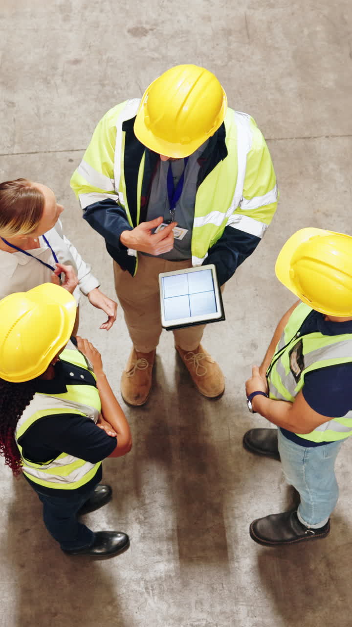 Construction Workers Planning with Tablet on Site