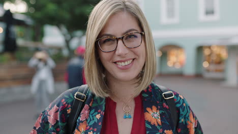 portrait-of-trendy-blonde-business-woman-laughing-positive-wearing-glasses-floral-shirt-enjoying-urban-travel