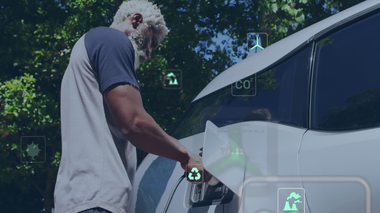 Animation of data processing and ecology icons over senior african american man fueling car