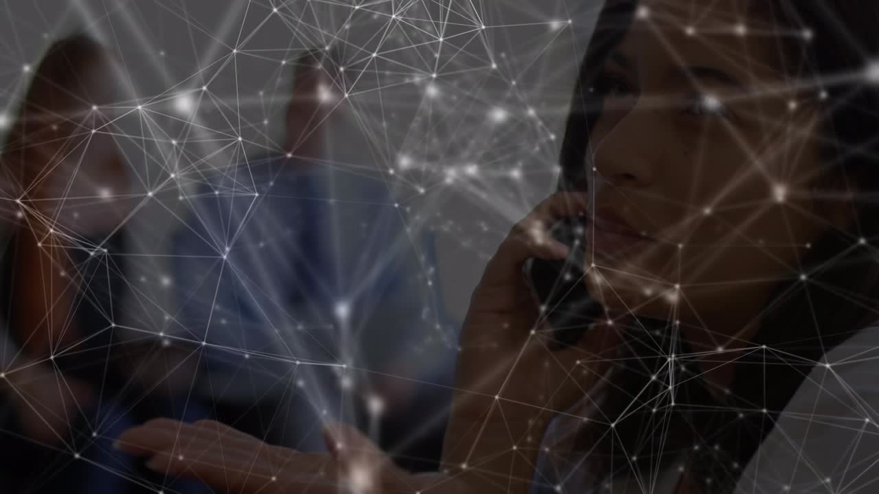 Animation of connected dots with lines over beautiful woman talking on smartphone