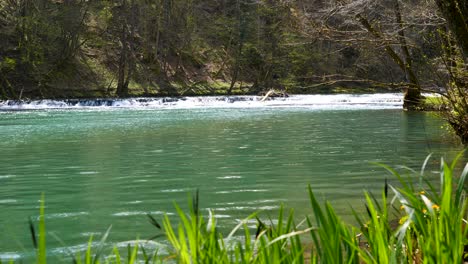 low static shot of a small quick flowing rapid on the krka river