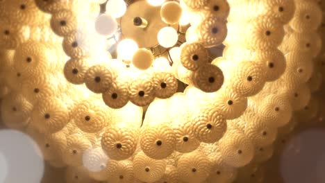 chandeliers spiral to soft light yellow like a dream.