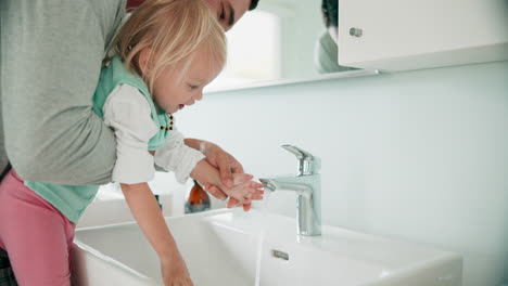 bathroom, father and daughter washing hands