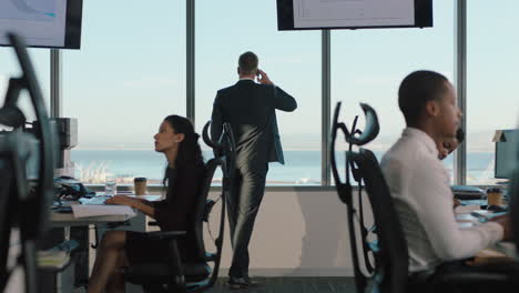 business man using smartphone having phone call chatting to client on mobile phone looking out window male executive discussing sales in busy office