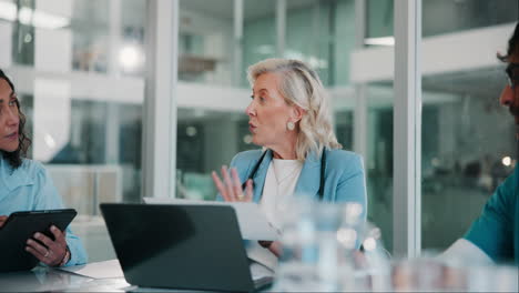 doctors in a meeting discussing healthcare