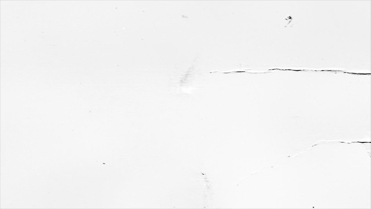 Vintage Film Overlay with Scratches and Dust on White Background