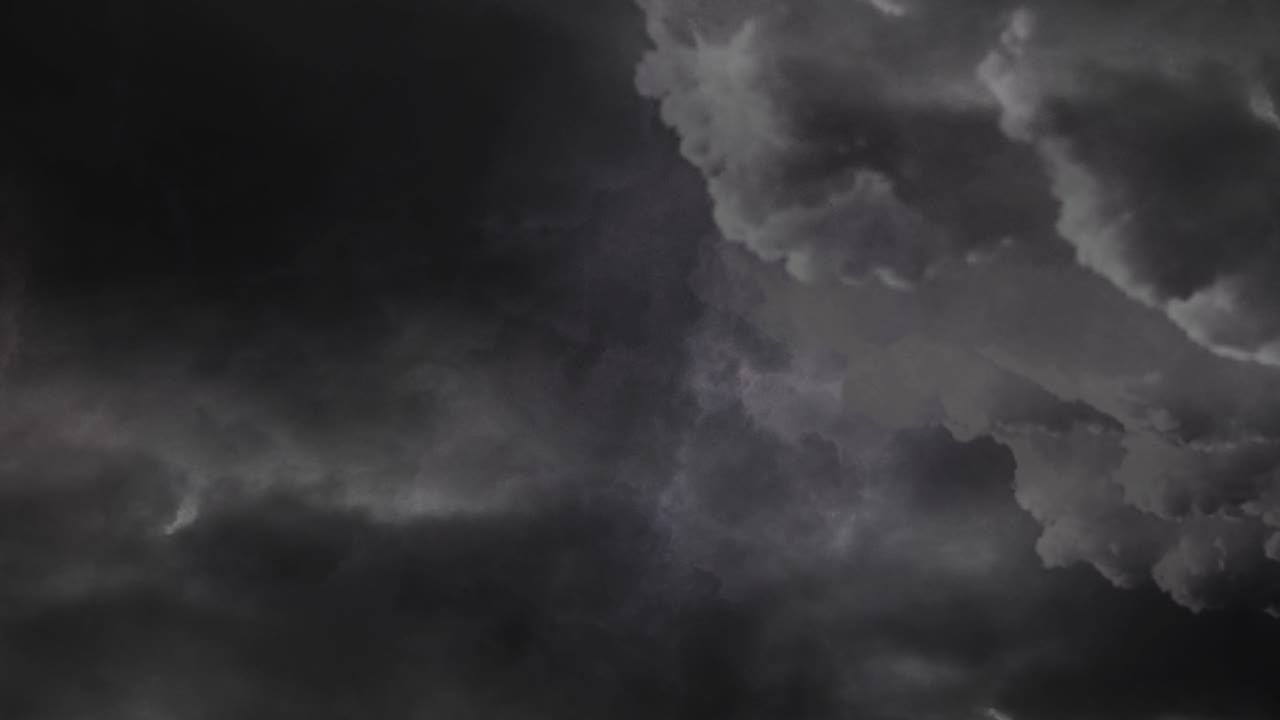 4k thunderstorm in dark  sky with moving clouds