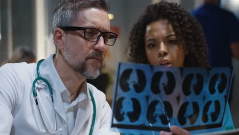 doctor and nurse reviewing x-ray