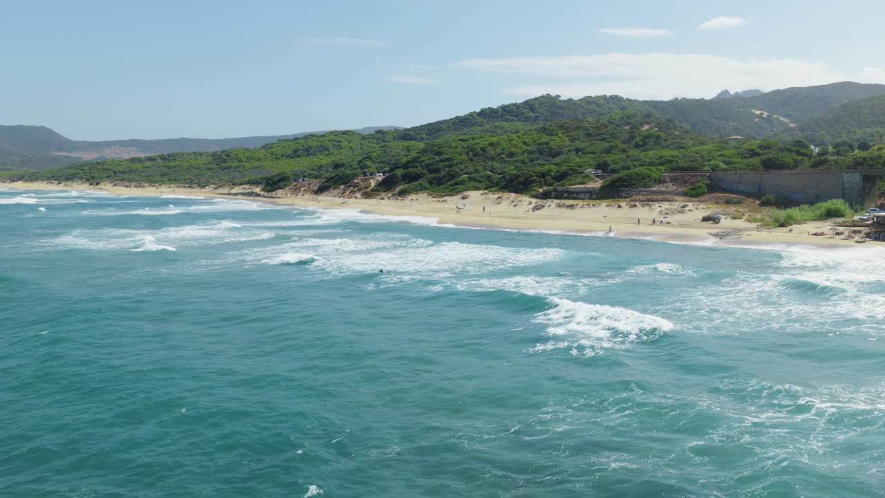Calm sea on Sardegna's west coast offers a tranquil seascape view