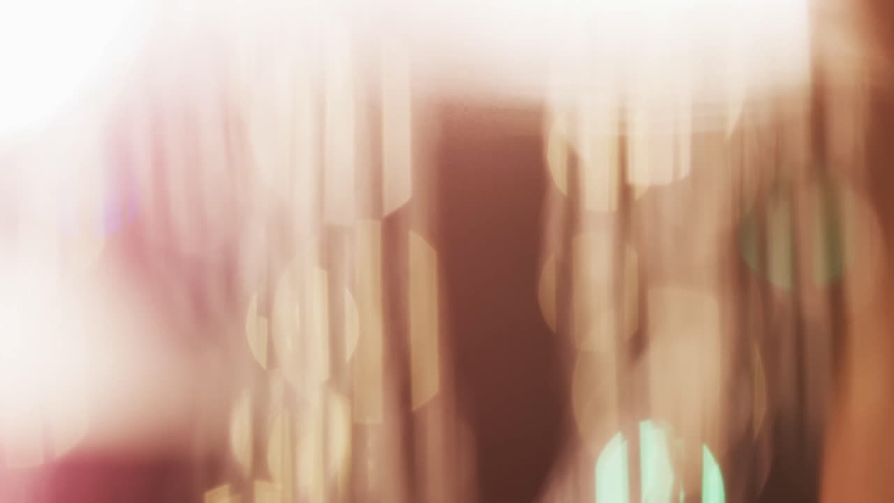 video de puntos de luz bokeh multicolores parpadeantes con espacio para copiar