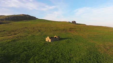 ruins of a house aerial in ireland’s eye - 4k cinematic drone footage 05.22