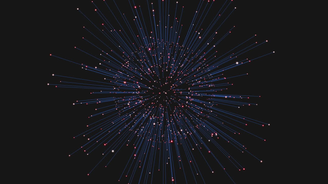 Vibrant red and blue firework bursts light up the dark sky. The colors pop against the black backdrop, capturing the exhilarating beauty of a firework display