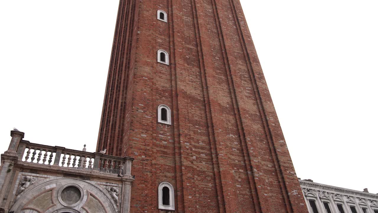 St marks campanile belltower in venice italy on grey foggy sky day