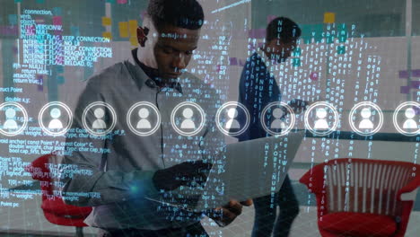 animation of icons and data processing over african american businessman at office