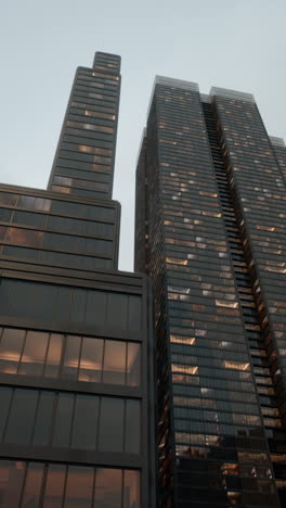 tall skyscrapers in a city at dusk