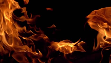 Flames-of-fire-on-black-background-in-slow-motion