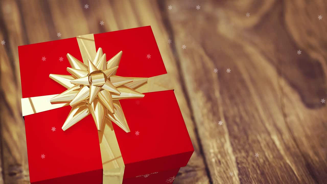 animación de la nieve cayendo sobre el presente en fondo de madera