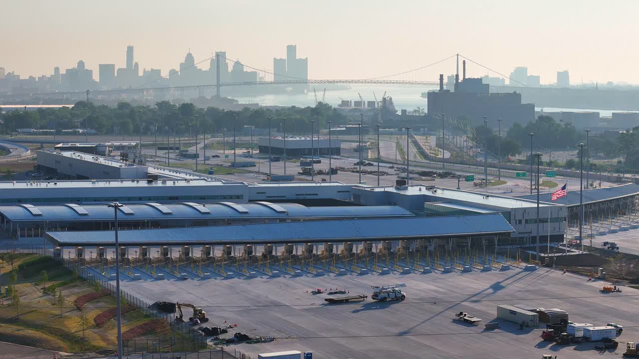 New customs terminal on the US side of the border with Detroit skyline in the background