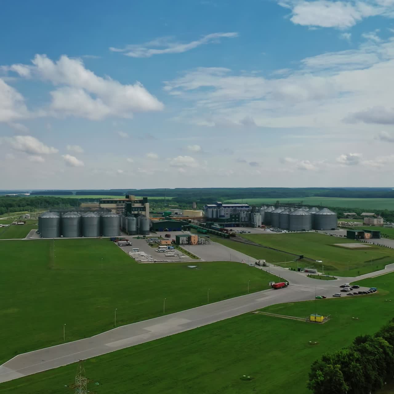 Grain elevators in meadow