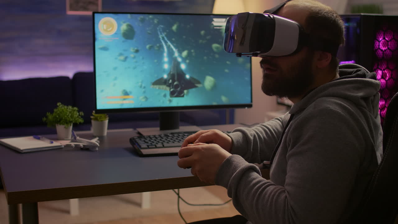 Competitive gamer winning space shooter video games championship