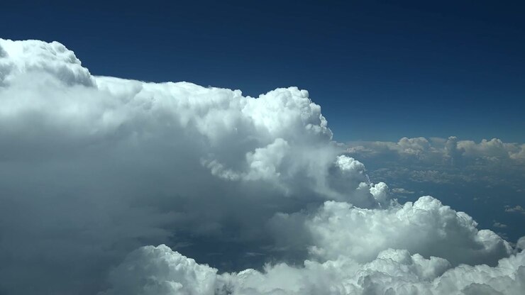 A pilot’s perspective of a huge storm cloud recorded from an airplane’s cabin at 12000m high