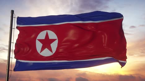 bandera de corea del norte ondeando en el viento contra el cielo profundo hermoso al atardecer