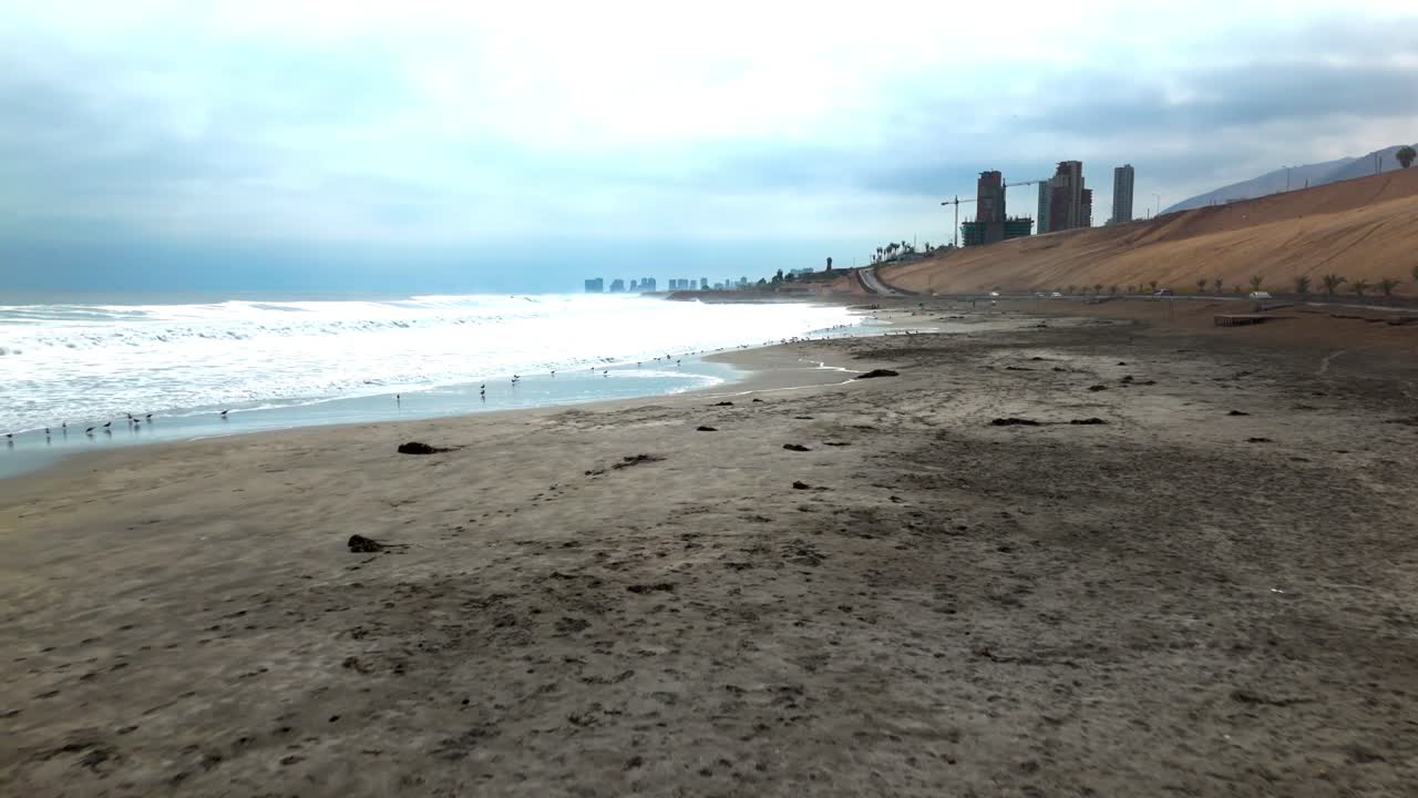 Huayquique beach Chile Iquique building ocean sea traffic tarapaca mountain drone view travelling sand