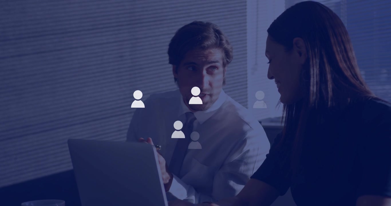 Man pointing at laptop while woman typing making user icons moving up left showing business growth