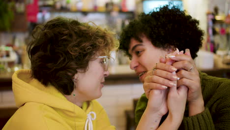 lesbian couple in a bar