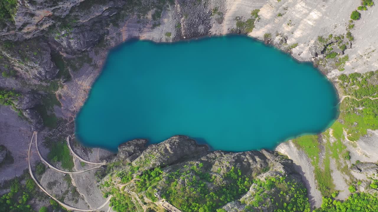 wonder of nature oval blue lake in Imotski. Croatia travel destination. Aerial