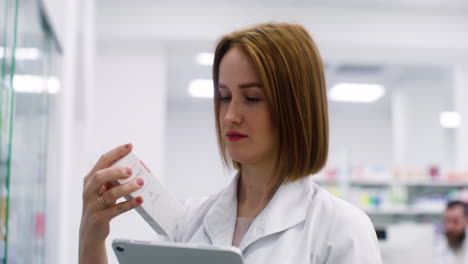 young woman using tablet indoors