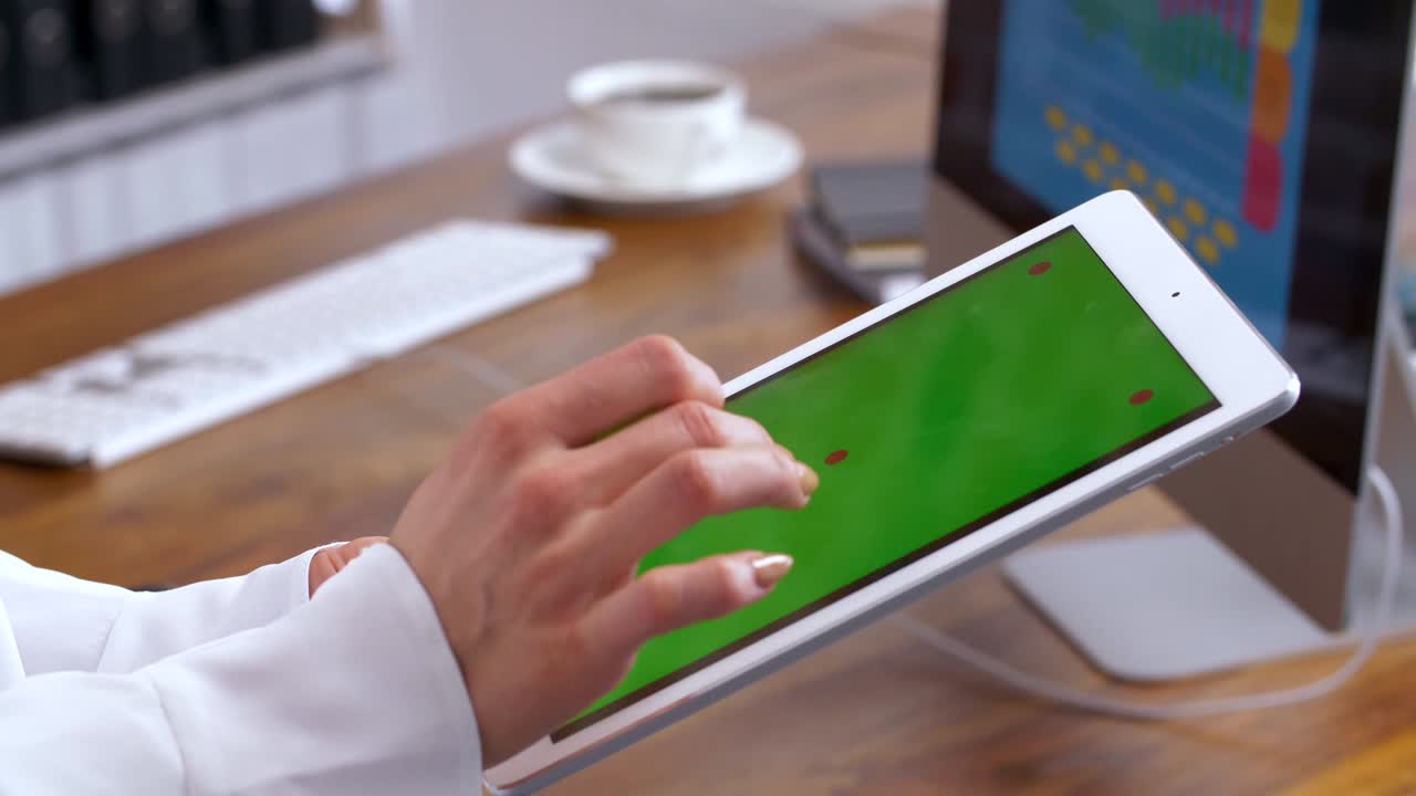 Human hand using a tablet