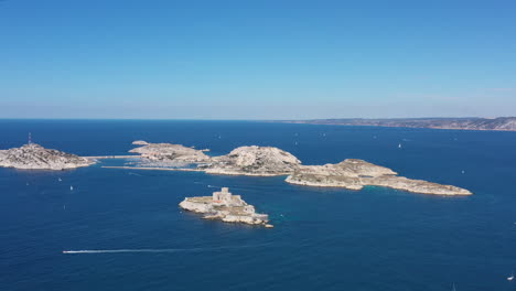 right to left traveling over the frioul archipelago with boats in front sunny