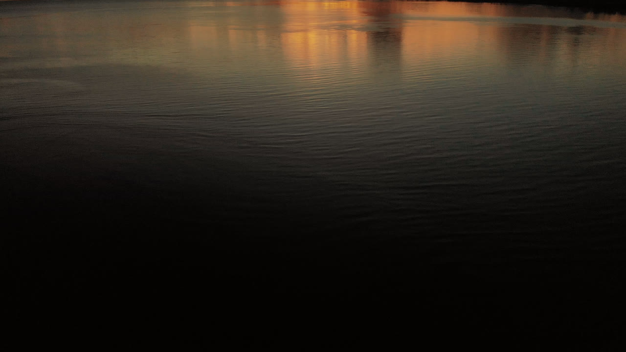 Drone looking up the sky as the sun rises