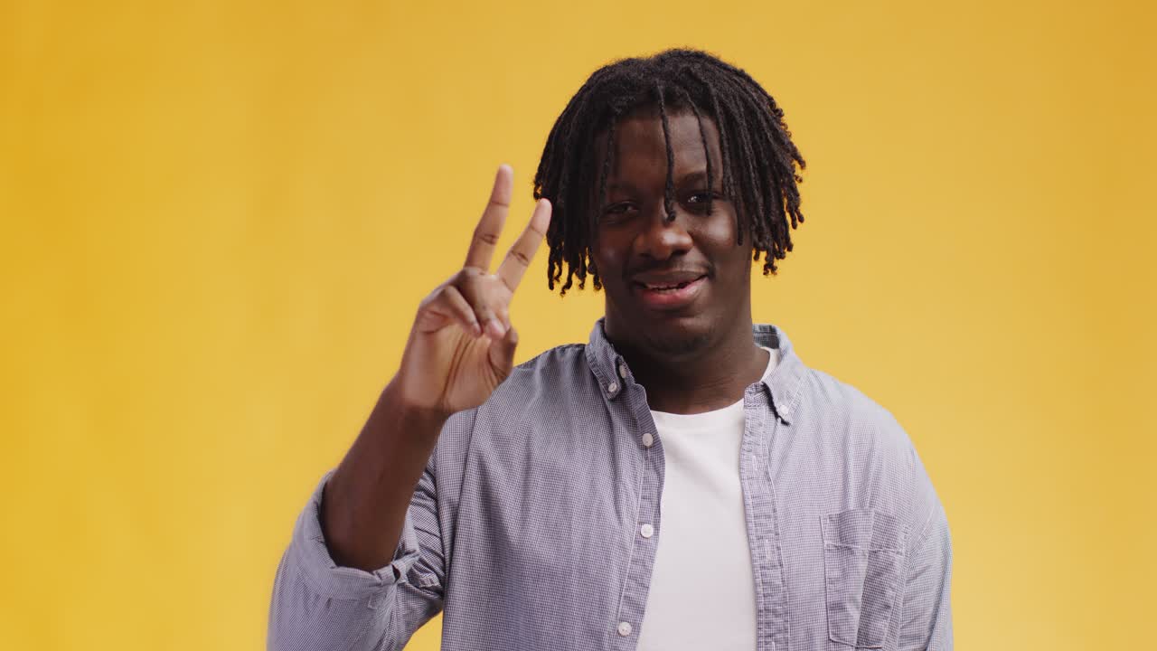 Man Making Peace Sign