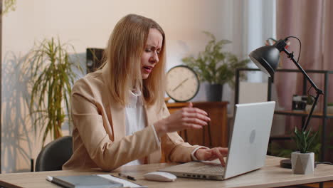 Bored-sleepy-business-woman-worker-working-on-laptop-computer,-yawning-falling-asleep-at-home-office