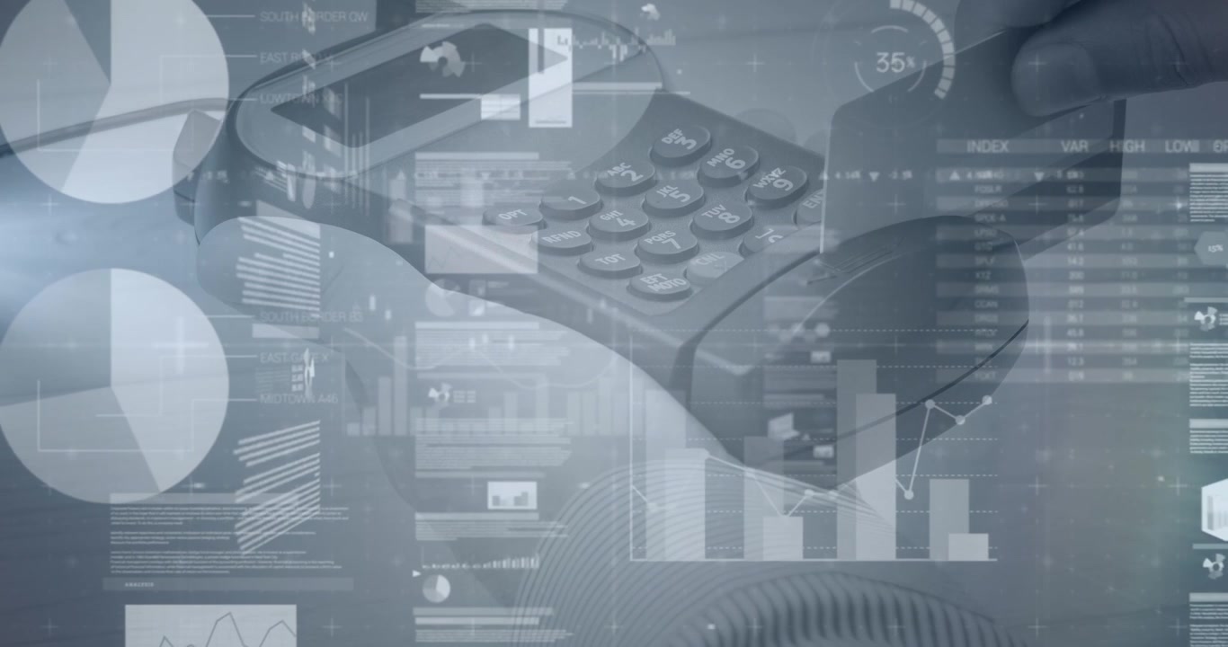 Animation of graphs and financial data over hand of caucasian man holding payment terminal