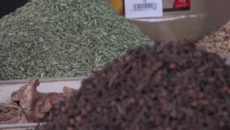 edible seeds and condiments on display at the traditional spice market in manama, bahrain