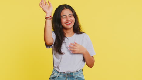 Happy-excited-Indian-woman-laughs-out-loud-after-hearing-ridiculous-anecdote,-reaction-on-funny-joke