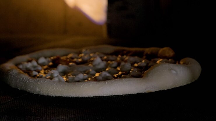 Close Up Of Italian Pizza With Cheese Baking In The Oven 2