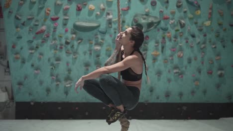 woman rope climbing