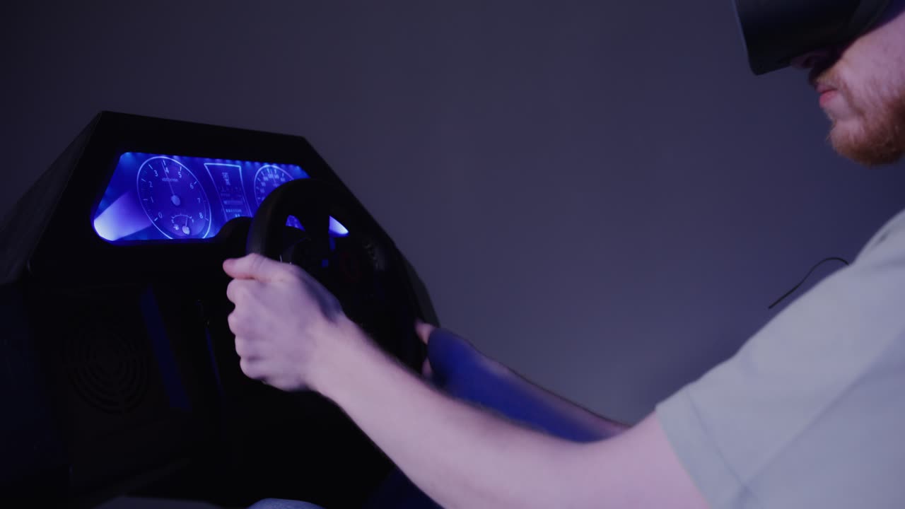Man using VR racing simulator