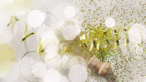 Animation-of-spots-of-light-over-gold-confetti-and-champagne-glasses