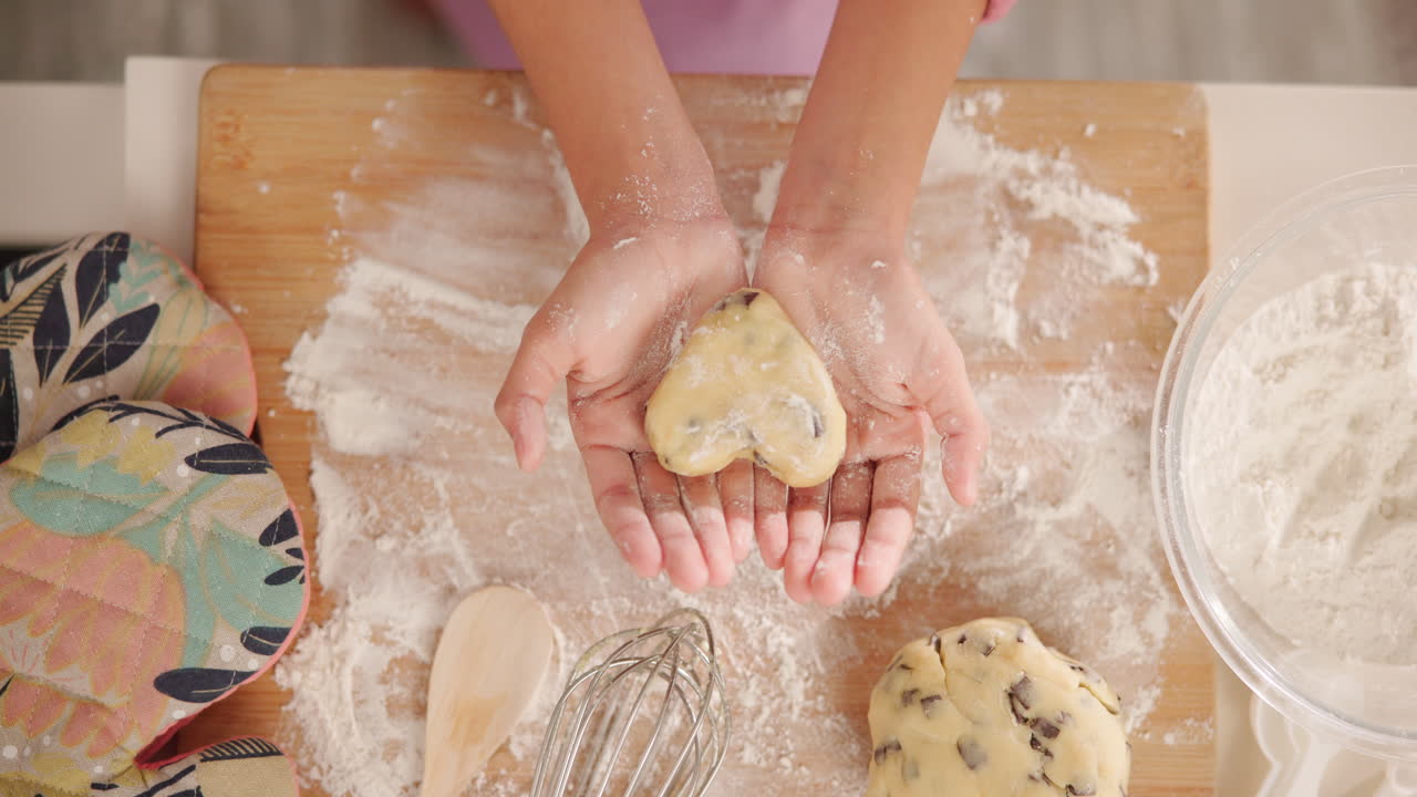Making heart-shaped cookies