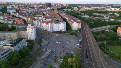 aerial view of a berlin city intersection with railway tracks