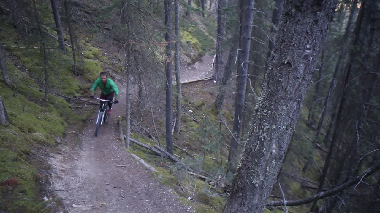 Biker riding uphill on a cloudy day