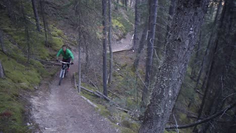 biker riding uphill on a cloudy day